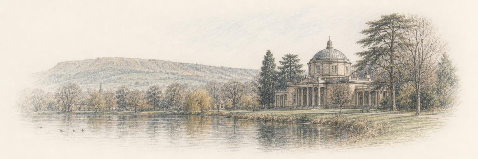 Cheltenham's domed Regency Pittville Pump Room seen across the lake in Pittville Park, with the Cotswold escarpment of Cleeve Hill in the distance.